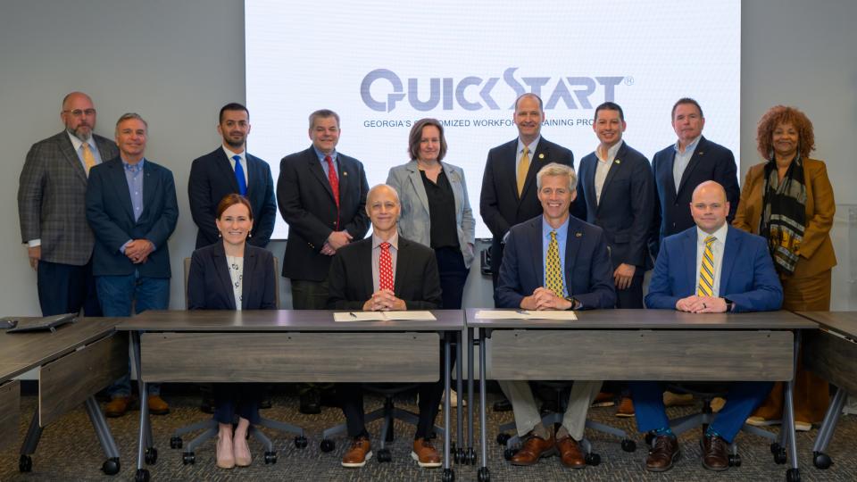 <p>Georgia Quick Start Deputy Commissioner Scott McMurray (center left) and Georgia Tech Executive Vice President for Research Tim Lieuwen (center right) gathered with members of the Georgia Tech Manufacturing Institute, Georgia AIM, and more to officially commemorate the partnership on April 8.</p> Georgia Quick Start Deputy Commissioner Scott McMurray (center left) and Georgia Tech Executive Vice President for Research Tim Lieuwen (center right) gathered with members of the Georgia Tech Manufacturing Institute, Georgia AIM, and more to officially commemorate the partnership on April 8.